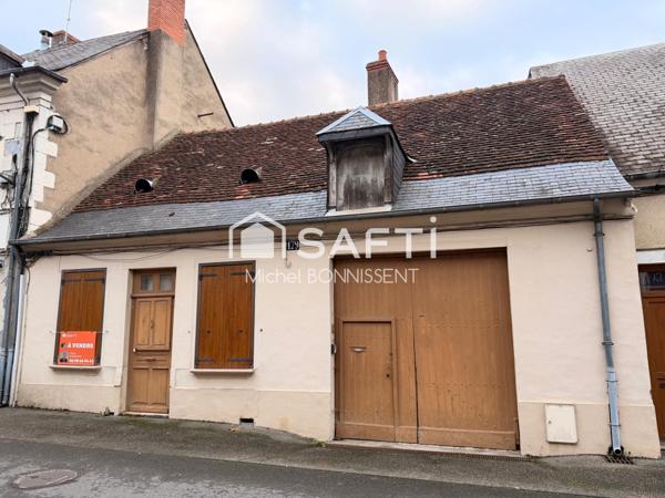 Maison centre ville avec garage et dépendances