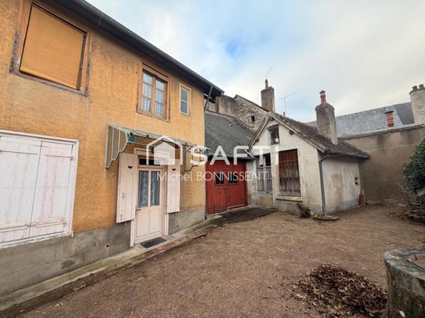 Maison centre ville avec garage et dépendances