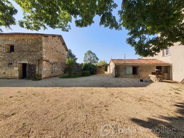Superbe maison de maître des années 1900, idéal pour une activité gîte ou grande famille.

Située dans un petit village à 2km de ROUILLE et 10kms de LUSIGNAN, retrouvez le charme de la pierre à la campagne aux portes de toutes commodités.

avec sa façade exposée plein Sud, elle se compose en rez-de-chaussée d'une vaste entrée avec sol en pierres naturelles, donnant sur une grande cuisine de 42m², un séjour et un salon de 60m², une chambres avec parquet massif de 38m², salle de bain + douche, WC séparée et chaufferie.
Au premier étage, un palier dessert 3 chambres (38, 18 et 18m²) et une salle d'eau avec WC.
Au deuxième étage, un grenier isolé, aménageable, avec poutres apparentes. Une cave sous parties de 15m² vient compléter le tout.

L'extérieur clos de 3838m² (divisible) n'est pas en reste. Vous retrouvez une terrasse plein Sud pour accueillir vos soirées en famille ou entres amis. Egalement un superbe tilleul de 100-150ans, plusieurs dépendances dont 2 garages, un carport pour votre camping-car, une ancienne écurie, un atelier avec four à pain fonctionnel. Un jardin potager, parc d'arbres fruitiers, piscine semi-enterrée, votre espace de bien-être se trouve ici.

Côté prestations, la maison dispose du double vitrage PVC et bois, volets battants en composite, plusieurs cheminées authentiques, chauffage fioul sur radiateurs fontes, parquets bois massifs, sols en pierres de Bourgogne, ancien évier en pierre. Assainissement individuel non conforme.

Venez découvrir les espaces et volumes généreux de cette charmante propriété. Contactez-moi pour plus de renseignements et une visite!