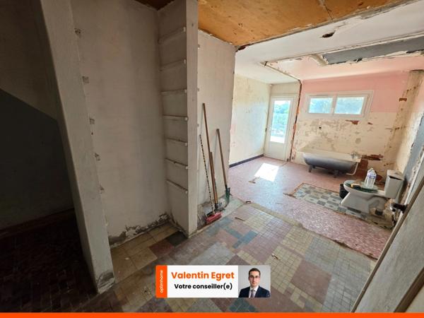 Maison de 120 m² à rénover avec vue panoramique, garage et jardin – Bolbec Centre