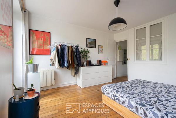 Appartement traversant entre le canal et les buttes Chaumont