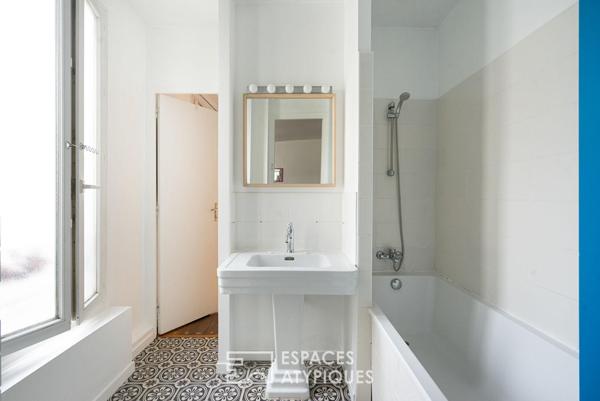 Appartement traversant entre le canal et les buttes Chaumont