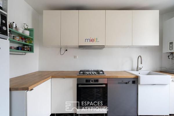 Appartement traversant entre le canal et les buttes Chaumont