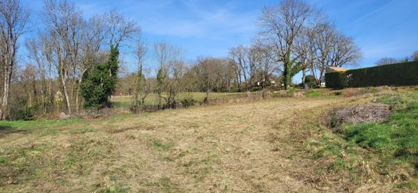 Beau terrain proche centre bourg secteur calme