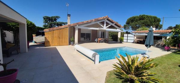 Maison 4 pièces de 118 m2 sur une parcelle de 1420 m² avec piscine chauffée
