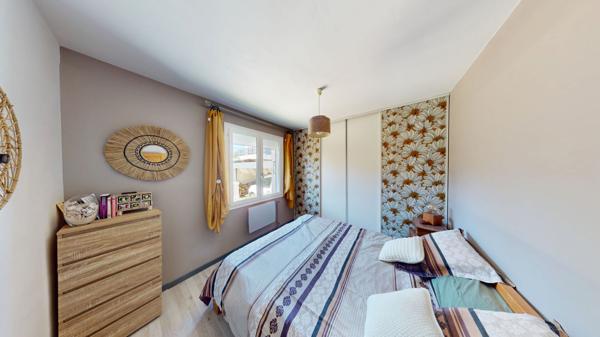Maison 4 pièces de 118 m2 sur une parcelle de 1420 m² avec piscine chauffée