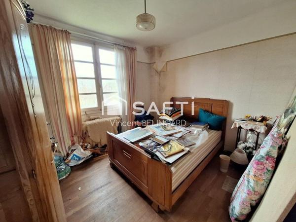 Maison à rénover avec garage et dépendance