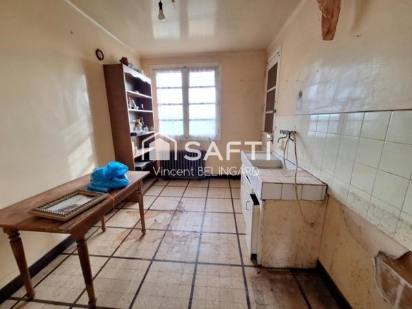 Maison à rénover avec garage et dépendance