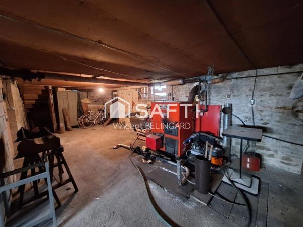 Maison à rénover avec garage et dépendance