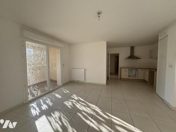 Appartement T3 avec balcon et garage, Résidence récente 