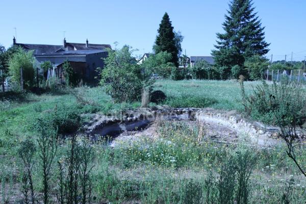 MAISON 4 CHAMBRES à rénover située dans un environnement calme proche du centre ville