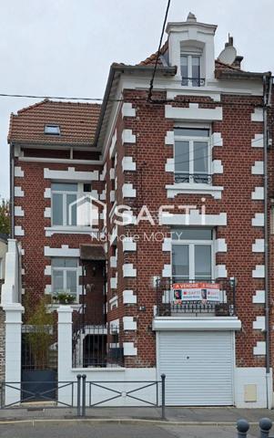 Superbe maison bourgeoise T8 avec un très beau jardin et un garage