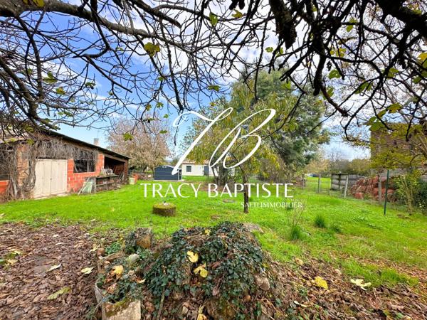 Raygades : Charmante maison de village à rénover avec jardin et garage.