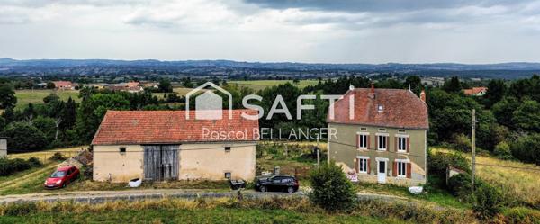 Découvrez cette charmante maison de 4 pièces située à Échassières, offrant une surface habitable de 108 m² sur un vaste terrain de 8680 m².