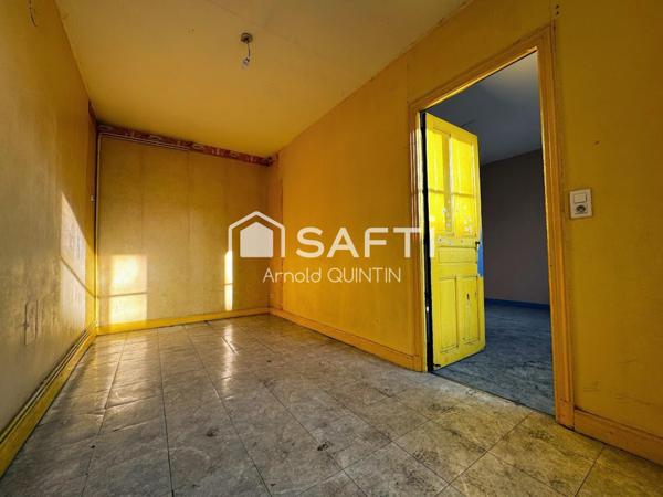 Immeuble 2 appartements + local commercial