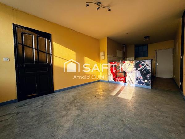 Immeuble 2 appartements + local commercial