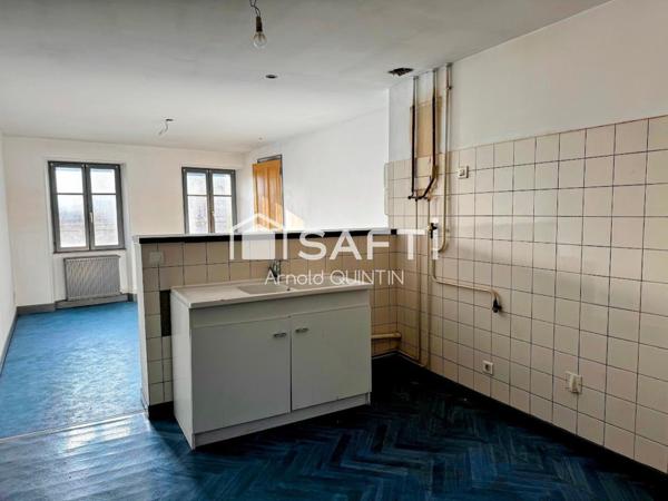 Immeuble 2 appartements + local commercial