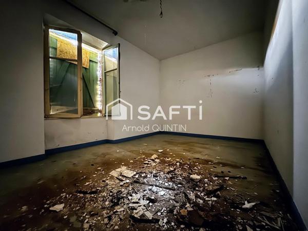 Immeuble 2 appartements + local commercial