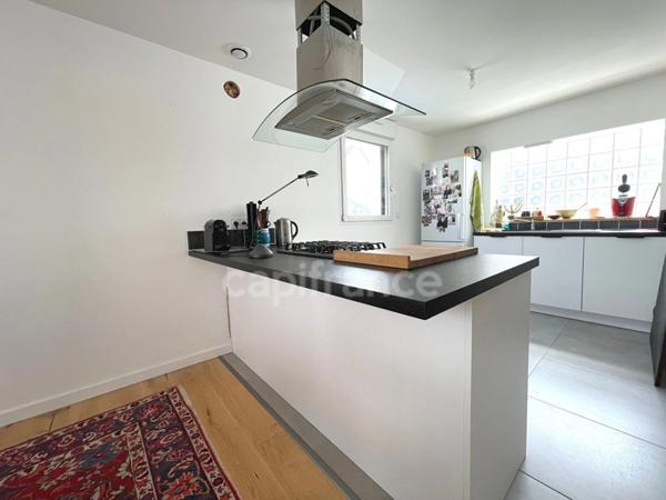 Quimper (29) - Maison centre ville de 75,21 m² habitable - 124 m² utiles - Terrasse - Double garage.