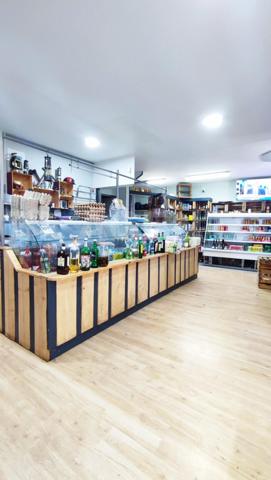 Immeuble 1 appartement + local commerciale.