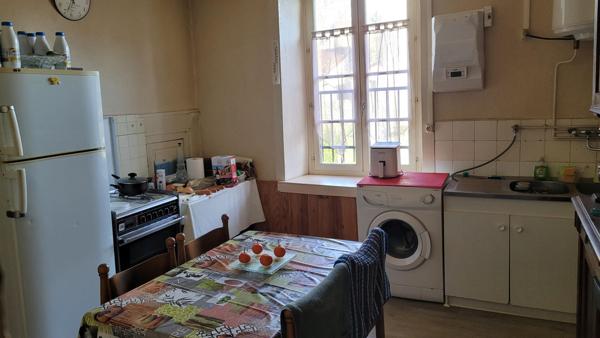 Bel immeuble avec terrain et garage