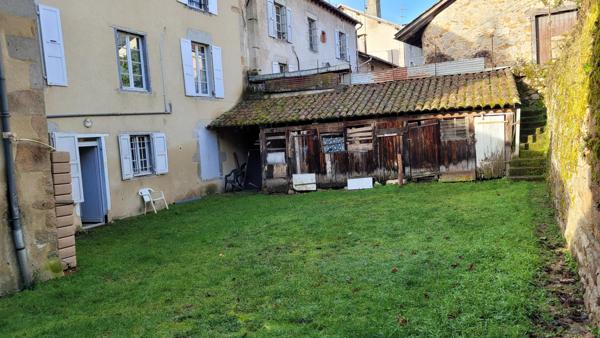 Bel immeuble avec terrain et garage