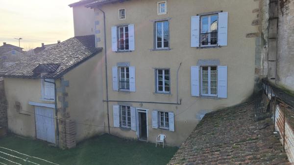 Bel immeuble avec terrain et garage