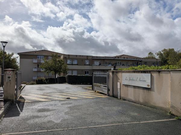 Place de parking dans résidence sécurisée