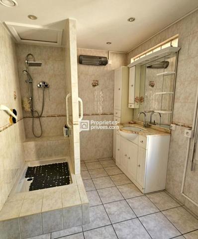 Maison 3 faces de 110 m² avec jardin de 400 m²