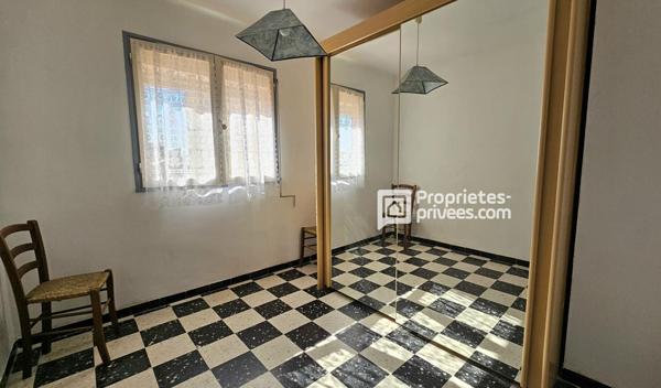 Maison 3 faces de 110 m² avec jardin de 400 m²