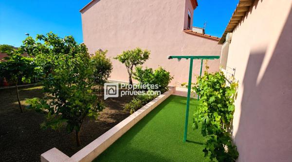 Maison 3 faces de 110 m² avec jardin de 400 m²