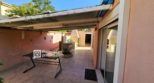 Maison 3 faces de 110 m² avec jardin de 400 m²