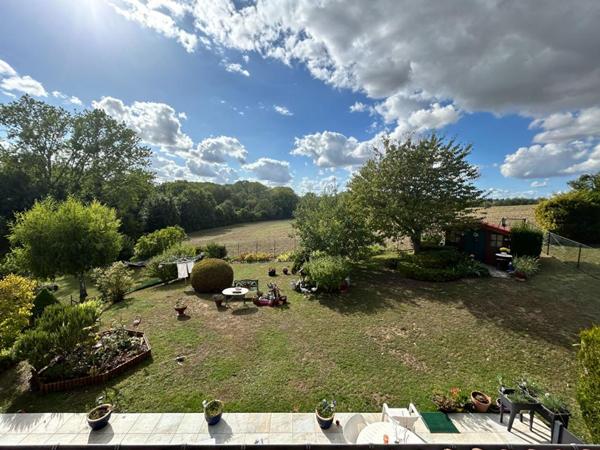 PAVILLON INDIVIDUEL ELEVE SUR SOUS -SOL TOTAL AVEC ACCES VOITURES