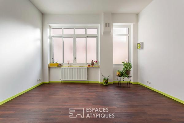 Appartement type loft avec cave attenante aménageable