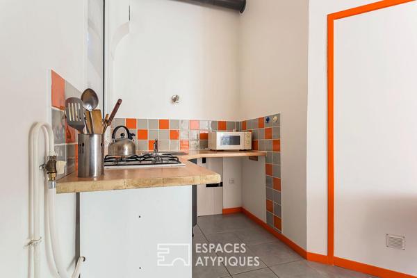 Appartement type loft avec cave attenante aménageable