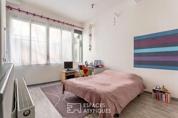 Appartement type loft avec cave attenante aménageable