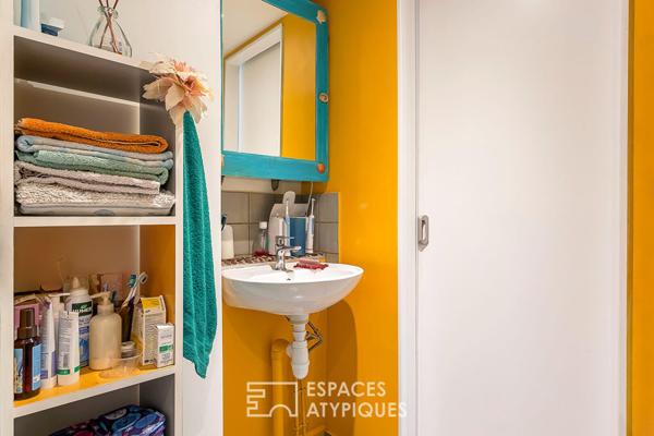 Appartement type loft avec cave attenante aménageable