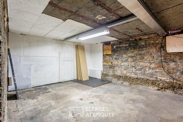 Appartement type loft avec cave attenante aménageable