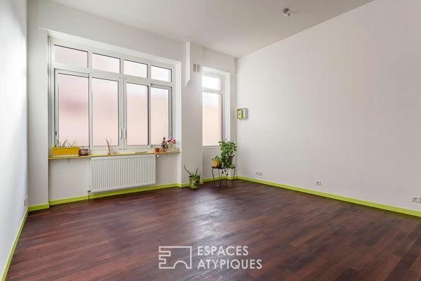 Appartement type loft avec cave attenante aménageable