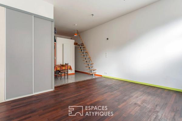 Appartement type loft avec cave attenante aménageable