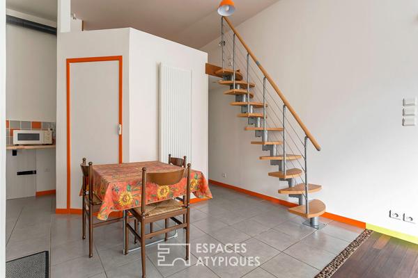 Appartement type loft avec cave attenante aménageable