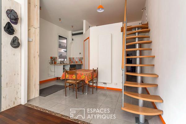 Appartement type loft avec cave attenante aménageable