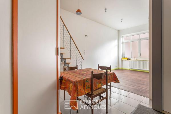 Appartement type loft avec cave attenante aménageable