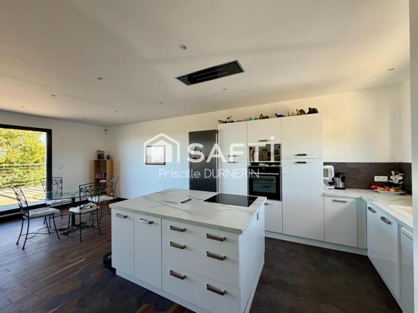 Maison de plain-pied - Vue - Terrain - Garage