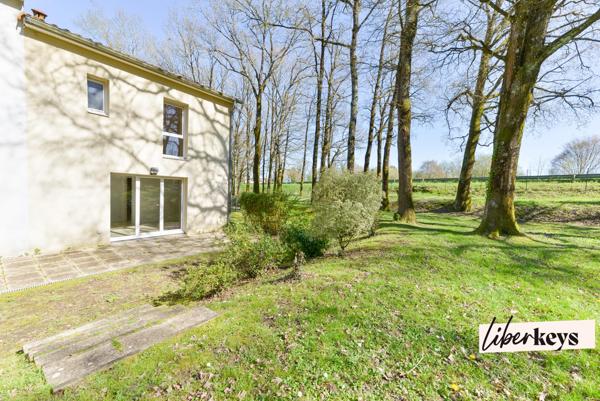 Duplex esprit maison avec jardin