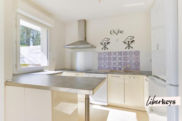 Duplex esprit maison avec jardin