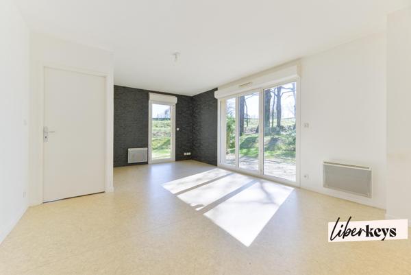 Duplex esprit maison avec jardin