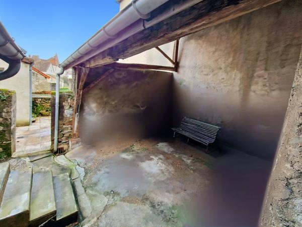 Maison sur Couches de 195 m2 avec cour et local commercial