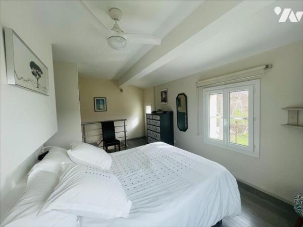 Maison 98 m² sur terrain arboré de 6 440 m² avec piscine