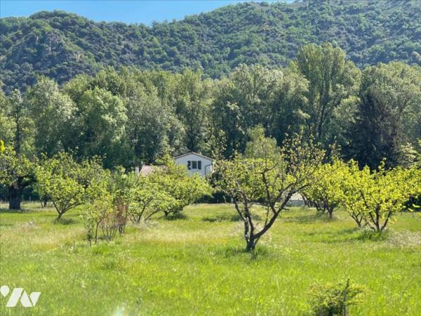 Maison 98 m² sur terrain arboré de 6 440 m² avec piscine